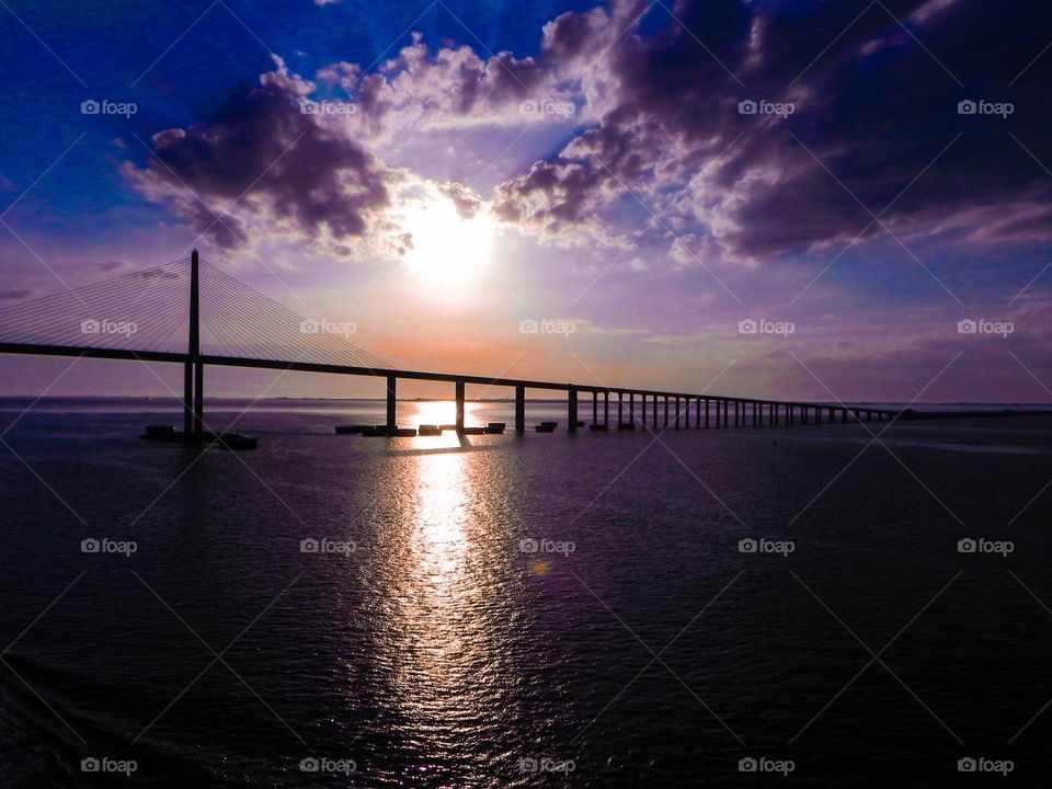Tampa Bay Bridge at Sunset. Passing under the Tampa Bridge 