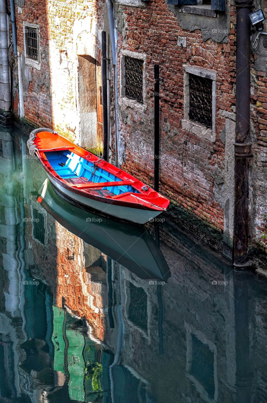 Boat reflection, Venice canal