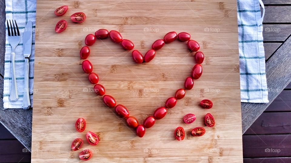 Heart of tomatoes. Kitchen. Preparing food. Cooking.