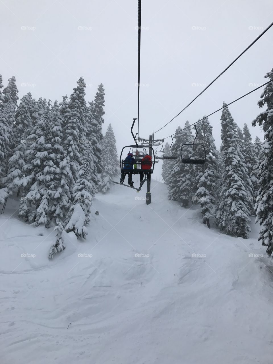 Steven pass, photo on the chair lift, snowboarding in the winter with good snow 