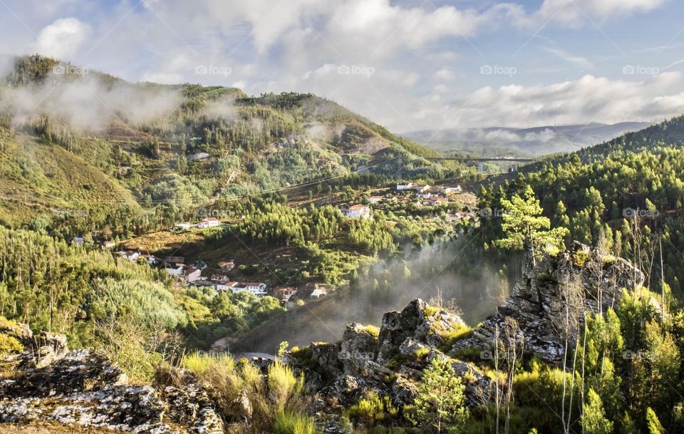 The view of the misty mountainous landscape from Fragas Sao Simao in Central Portugal 