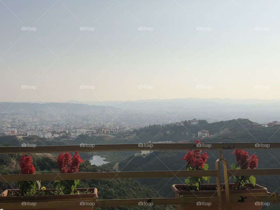 Balcony flowers view mountain city panoramic view 