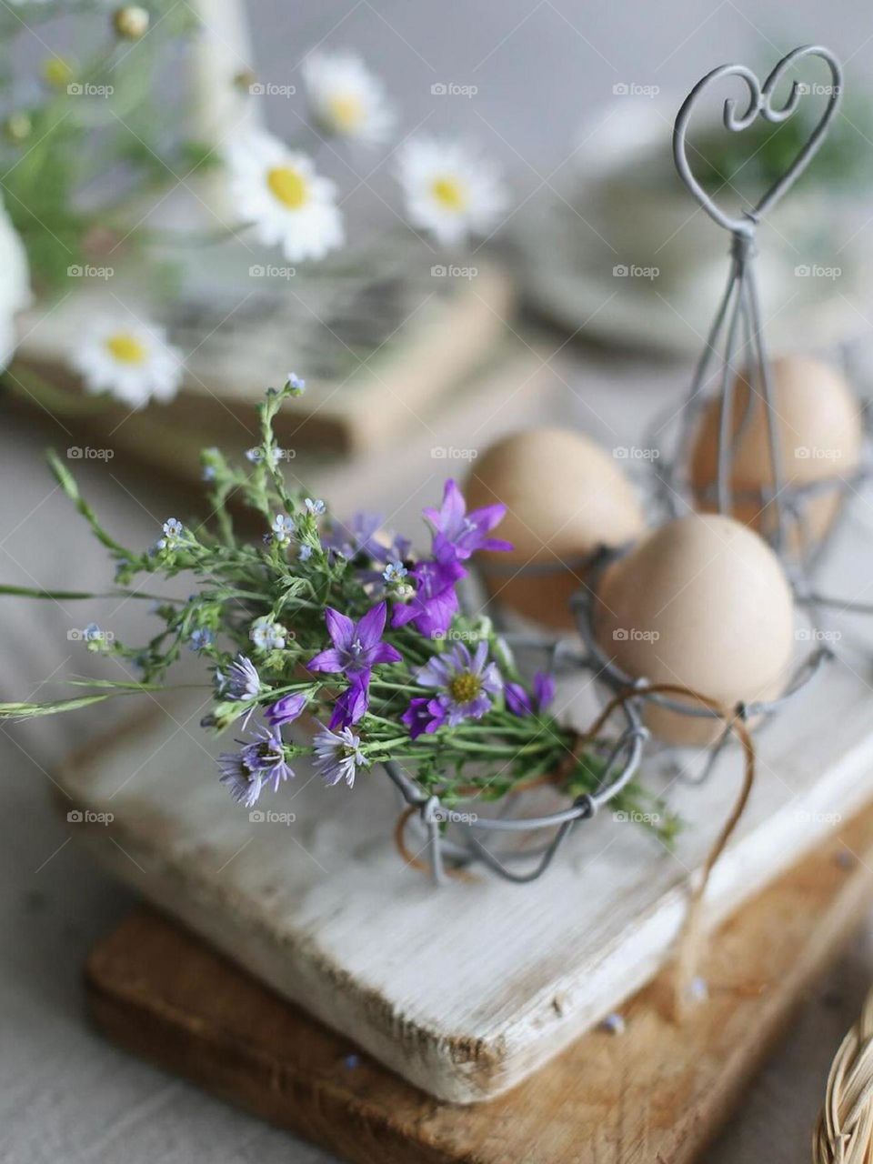 Wild purple flowers in an egg container! That is a little weird ! But flowers make everything beautiful...