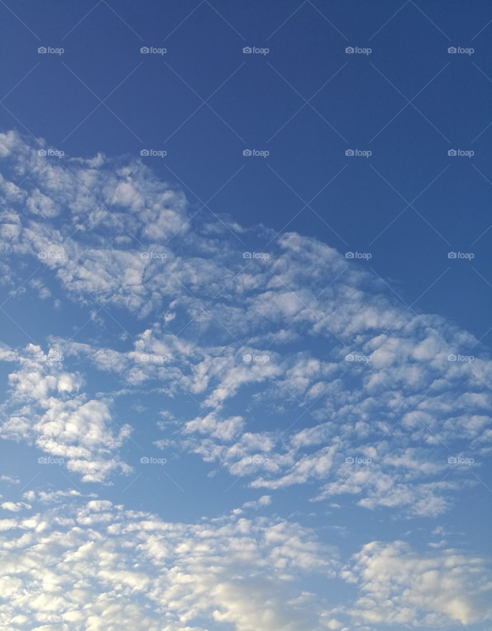 beautiful cumulus clouds on blue sky