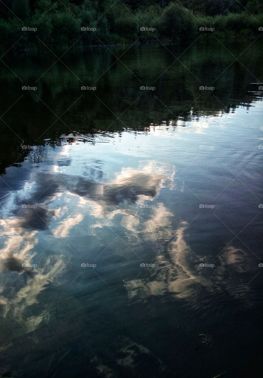 Reflections. Water. Clouds.