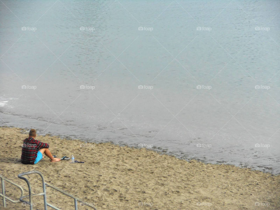 Contemplation . Beach scene 