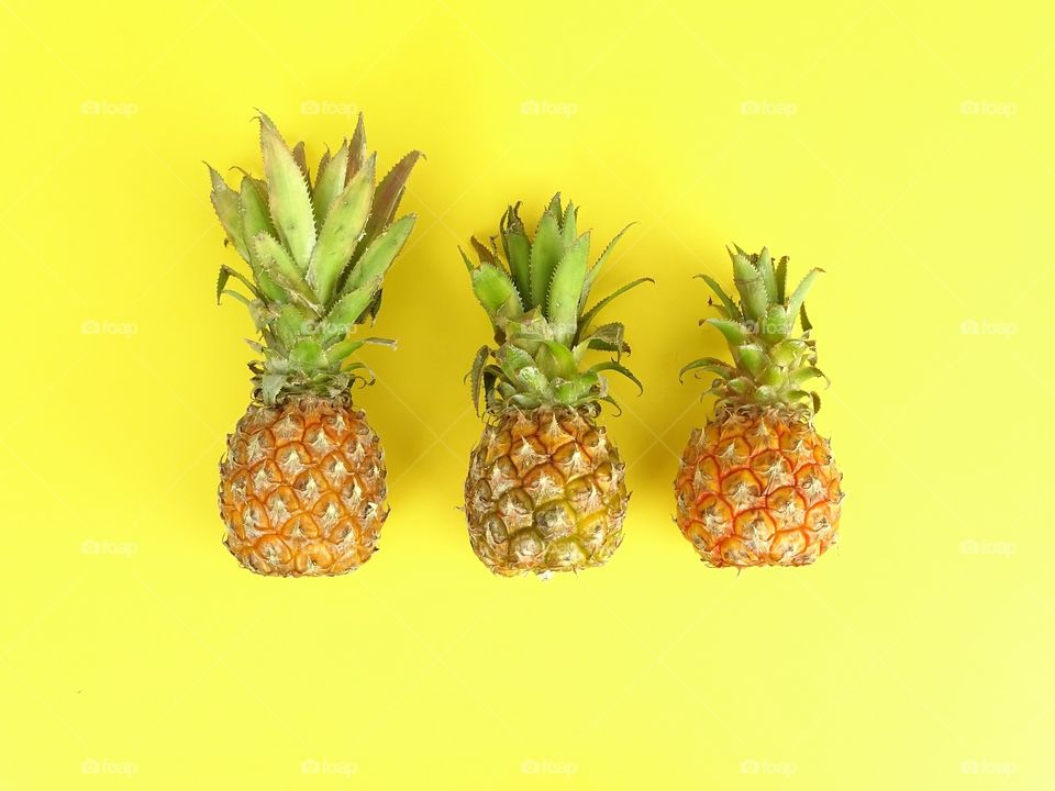 Three mini pineapples