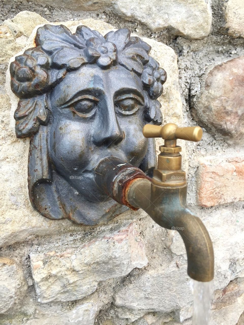 Old artistic tap,closeup view