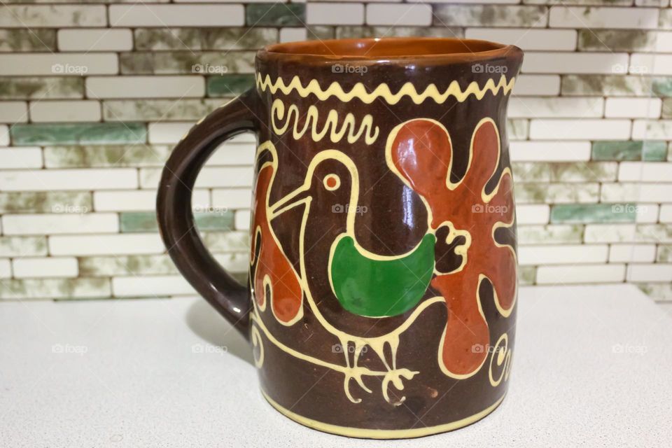 Clay jug with a pattern