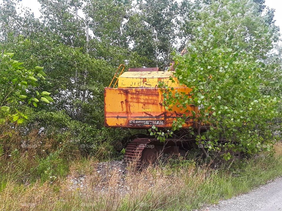 abandoned trackhoe