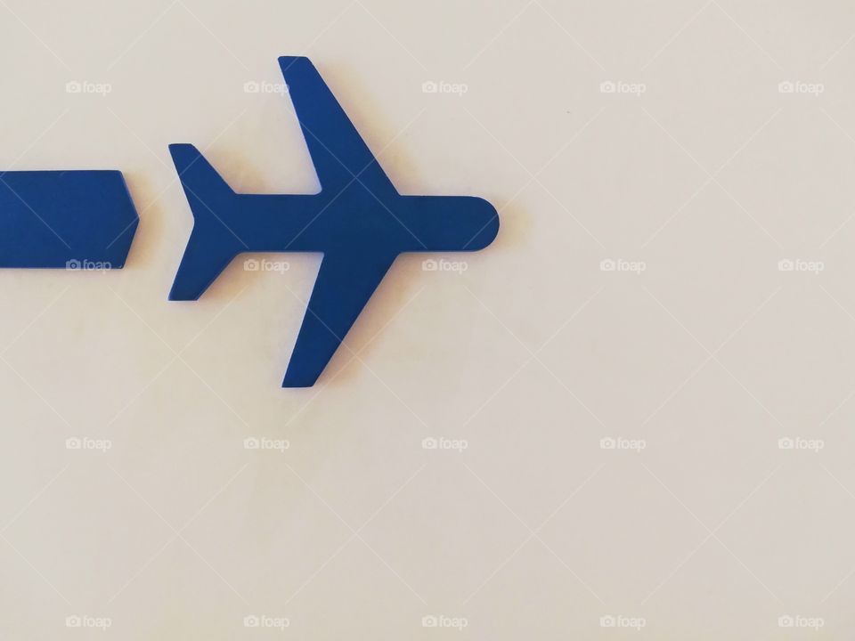 Plane symbol on a white background