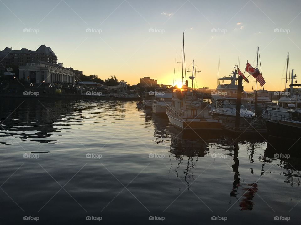 Sunset over the harbour in city of Victoria