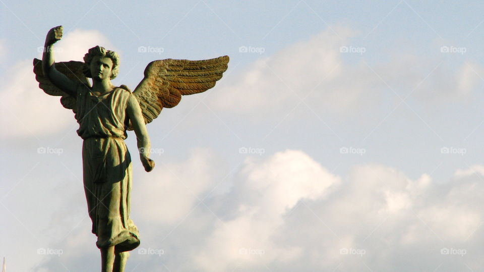 Angel. . Puebla's Guardian. Sculpture at the Santo Domingo Church, Puebla, Mexico. 