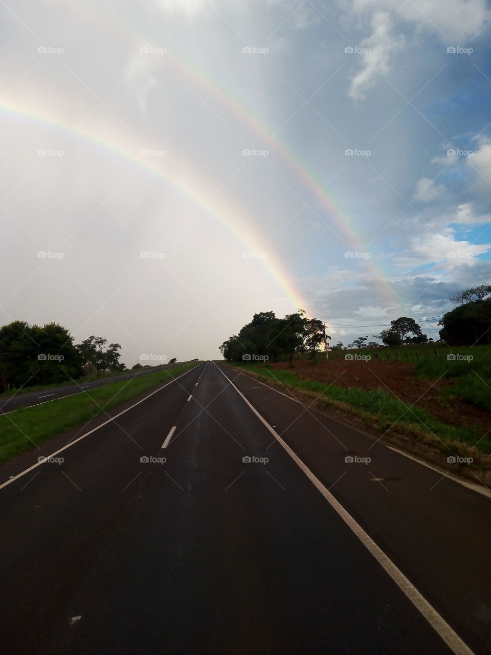 dois arcos iris e a chuva