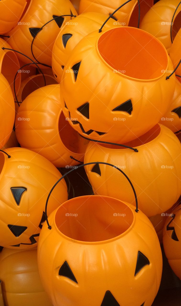 Halloween Time!. A bin of plastic jack o' lanterns. 