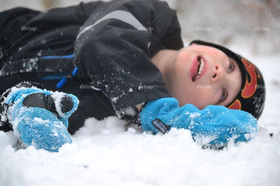 Boy enjoying the snow