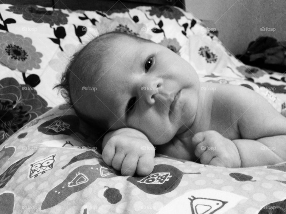 Close-up of a baby on bed