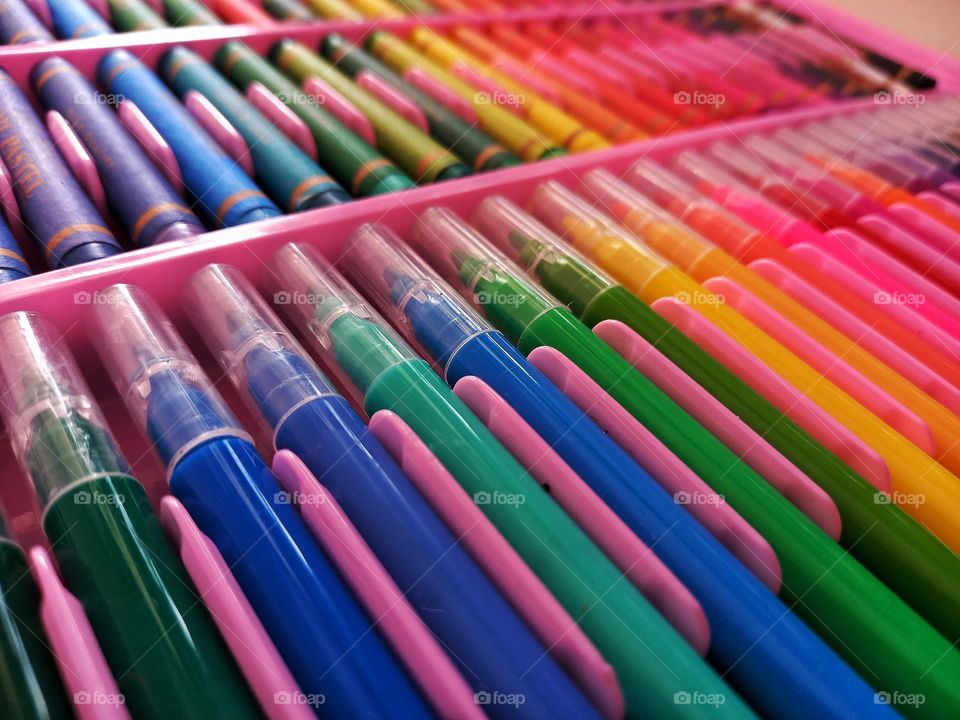 Color crayons in a box.