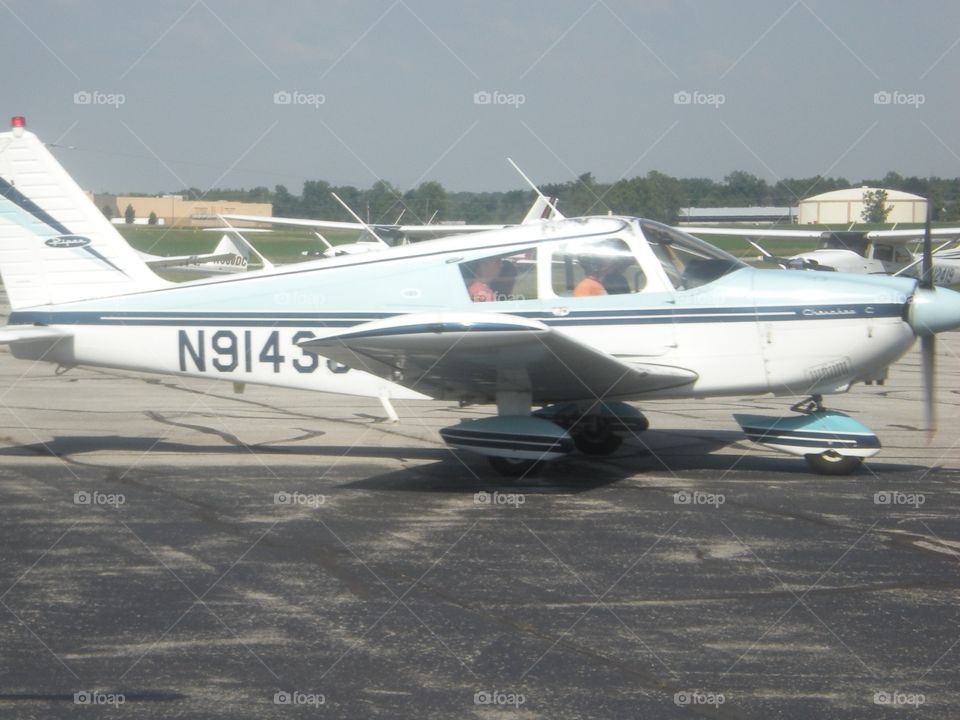 Small plane loaded with passengers before take off