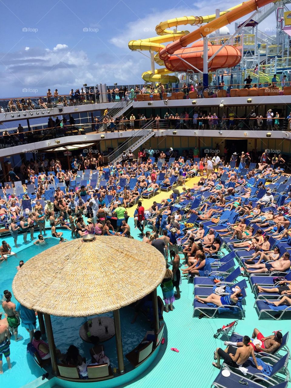 Crowds of the Crowds Revolution: sundeck and water slide on the cruise ship