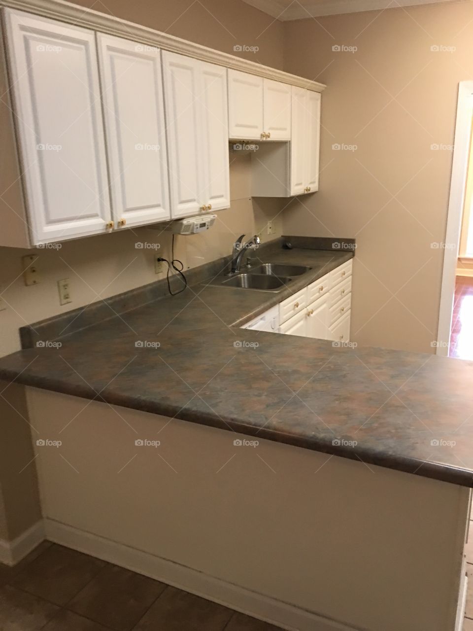 This kitchen is in need of a complete makeover 