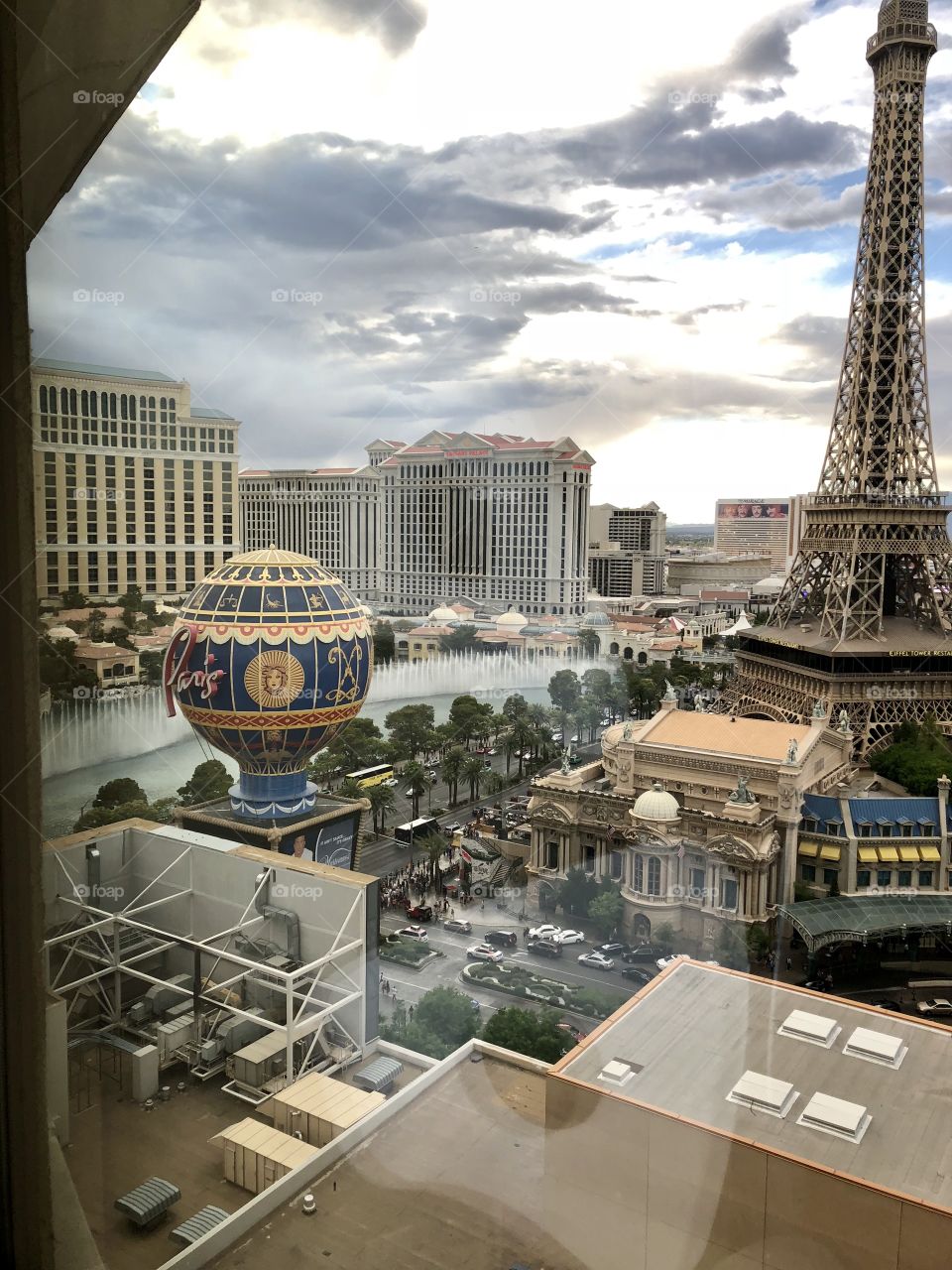 Las Vegas skyline including dancing waters at Bellagio from Planet Hollywood Hotel windows.