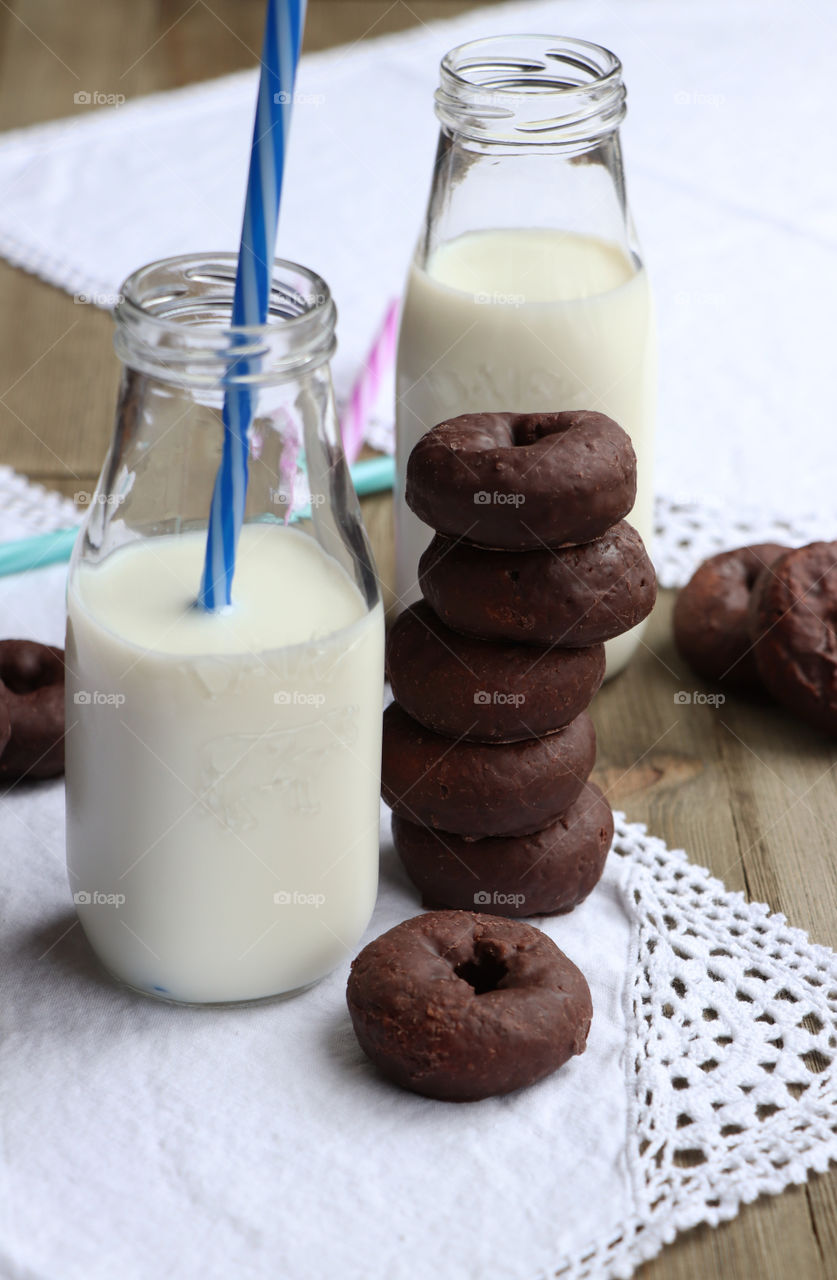 Chocolate donuts and fresh milk