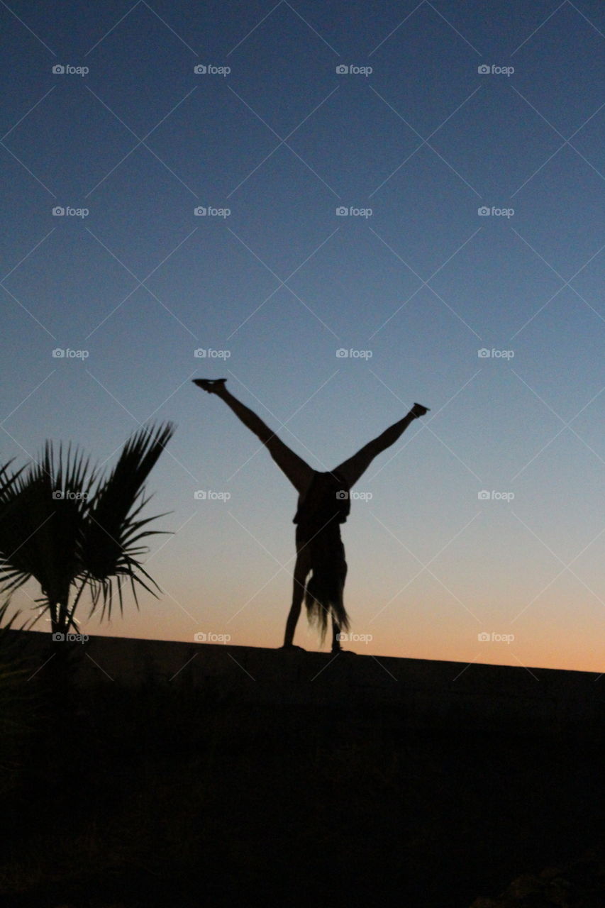 sunset handstand