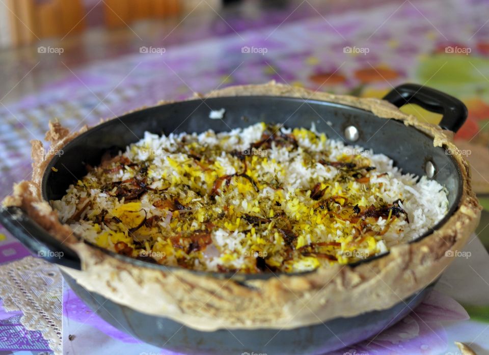 Biryani , is a South Asian mixed rice dish along with red meat,  aromatic spices and flavours and having its origins among the Muslims of the Indian subcontinent. It is popular throughout the world.