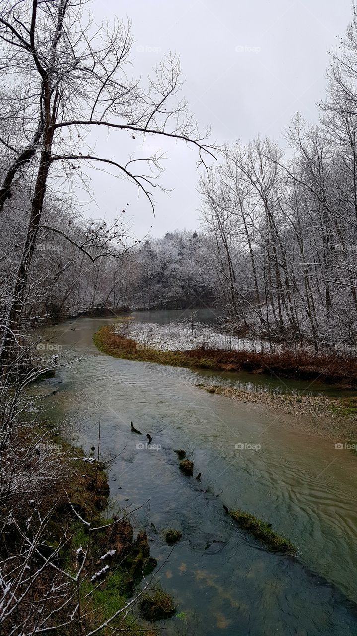 downstream from the spring