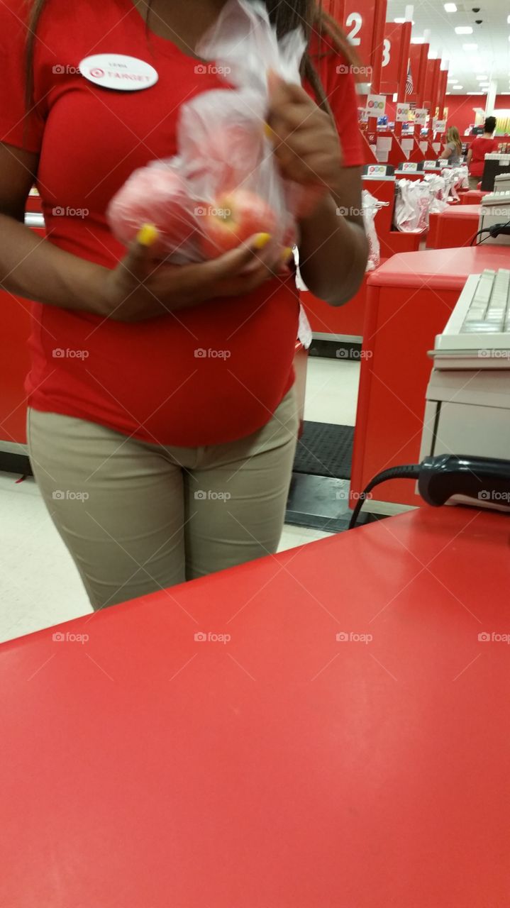 Beautiful young cashier checked me out at Target. The red apples, red blouse covering baby bump, and red Target color all around just screwed, "I'm ready for my close-up  Mr DeMille."