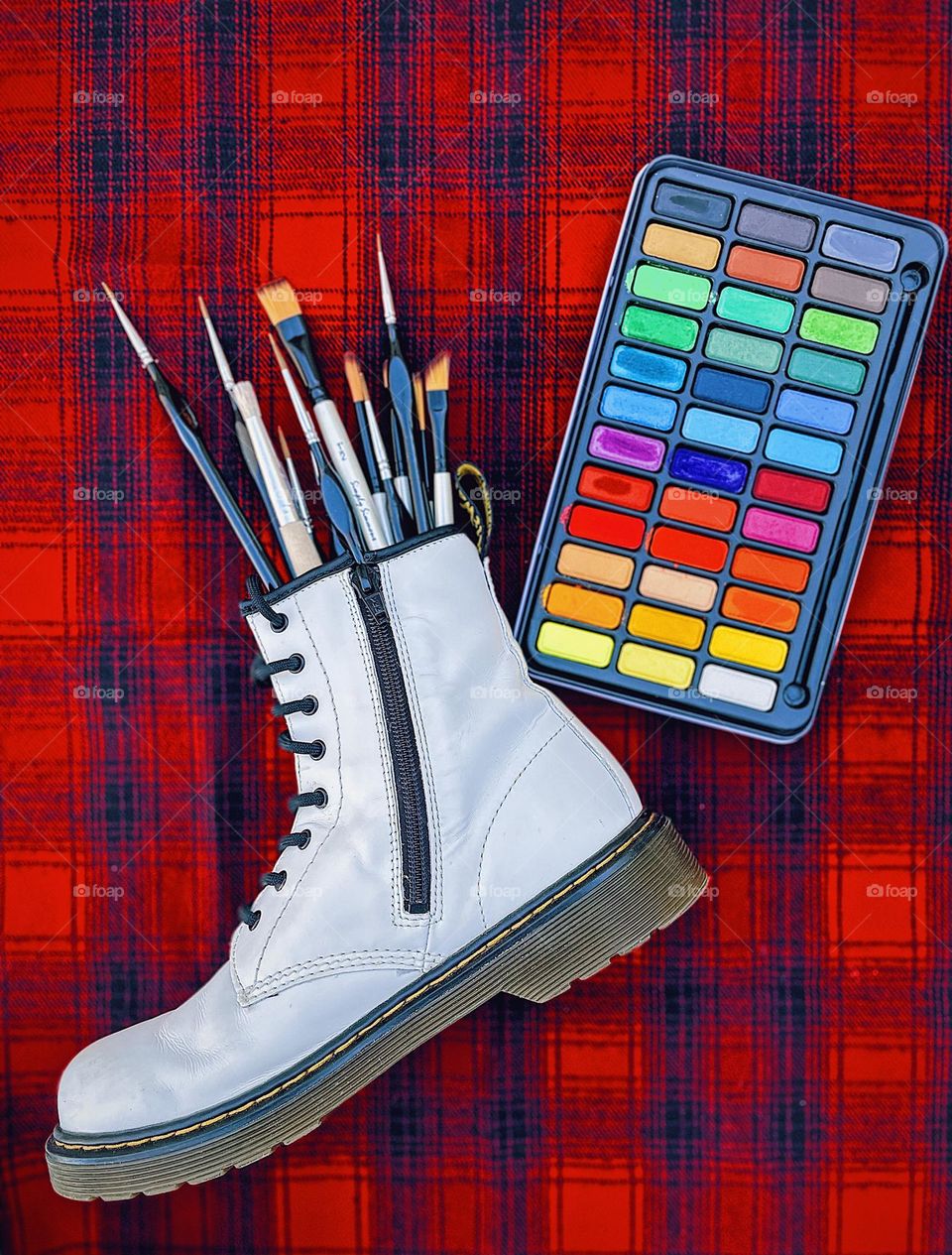 Artists wearing Doc Marten boots, getting creative with Dr. Marten boots, paints and DMs, art and boots, brushes and boots, Doc Marten white boots