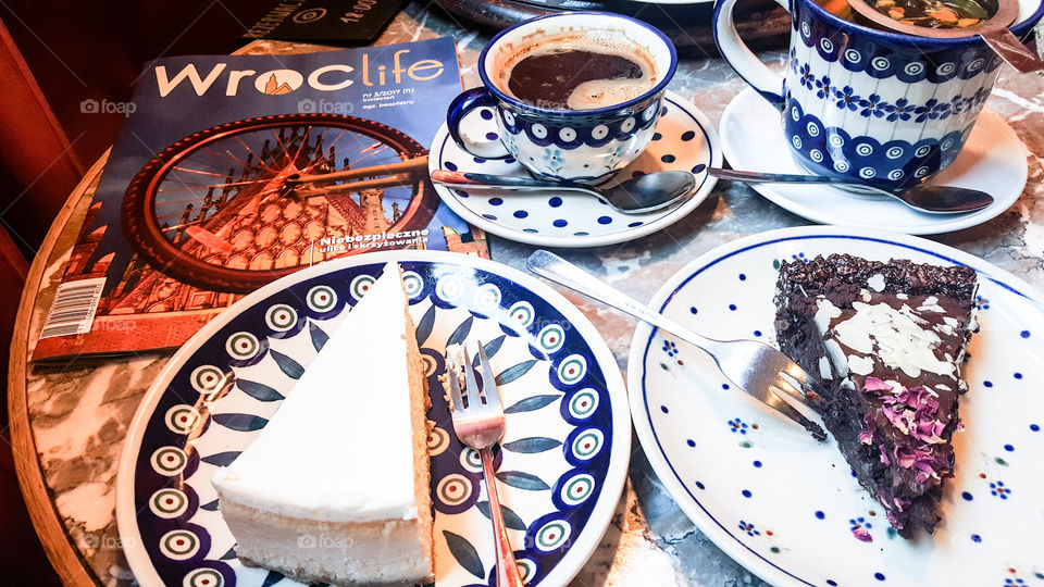 Coffee break in one of interesting cafe in Wroclaw, Poland. The aroma of coffee, sweetness of the cake and  classic ambience uplift the senses.