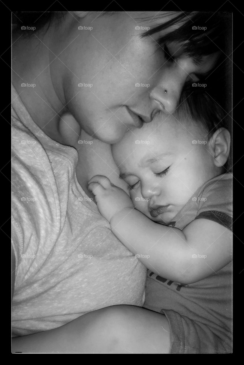 baby and I. holding my son while hes sleeping