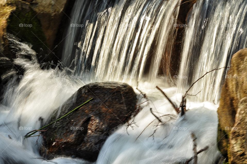 waterfall in the spring park in Poland