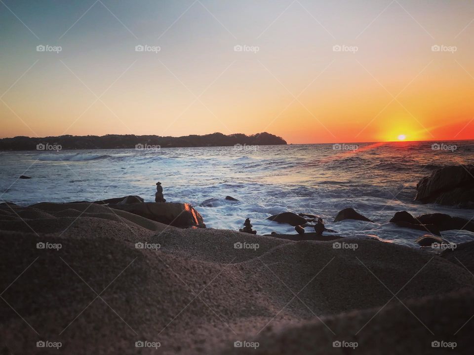 Atardecer en la playa, paisaje