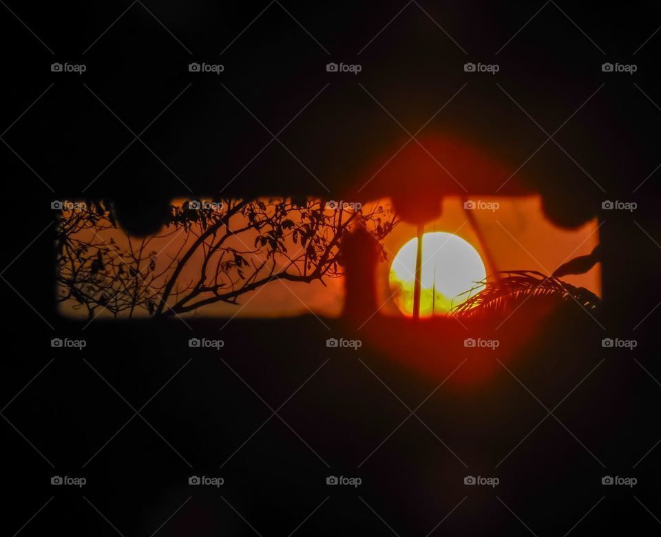 Sunrise from behind the window