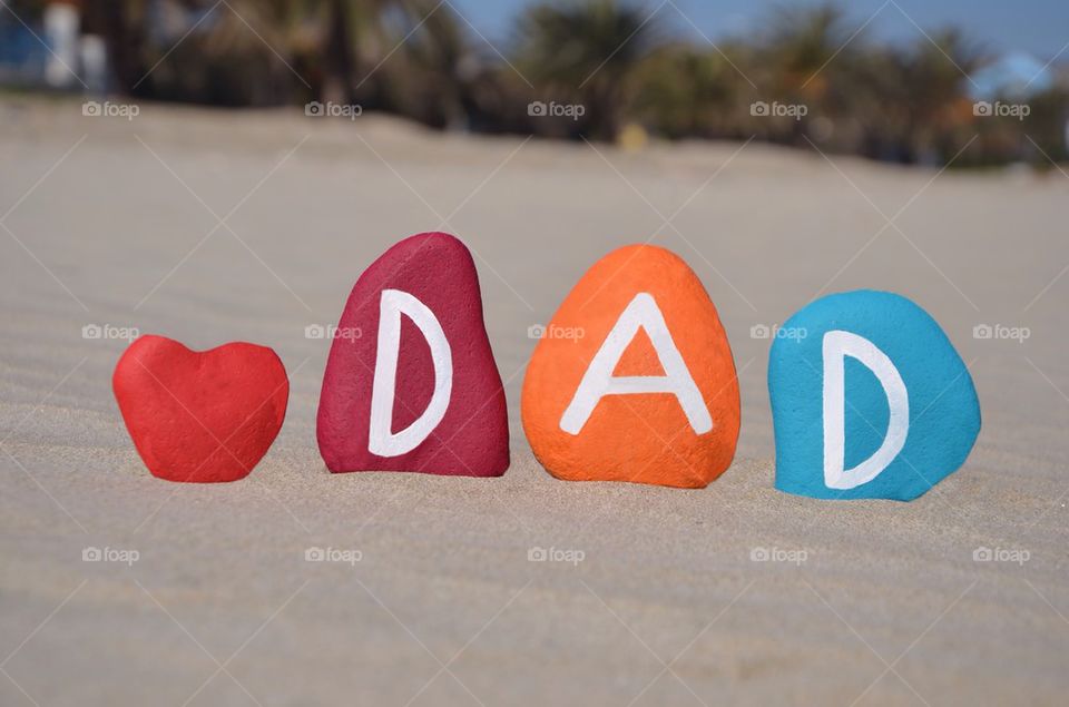 Dad word made with multi coloured stones