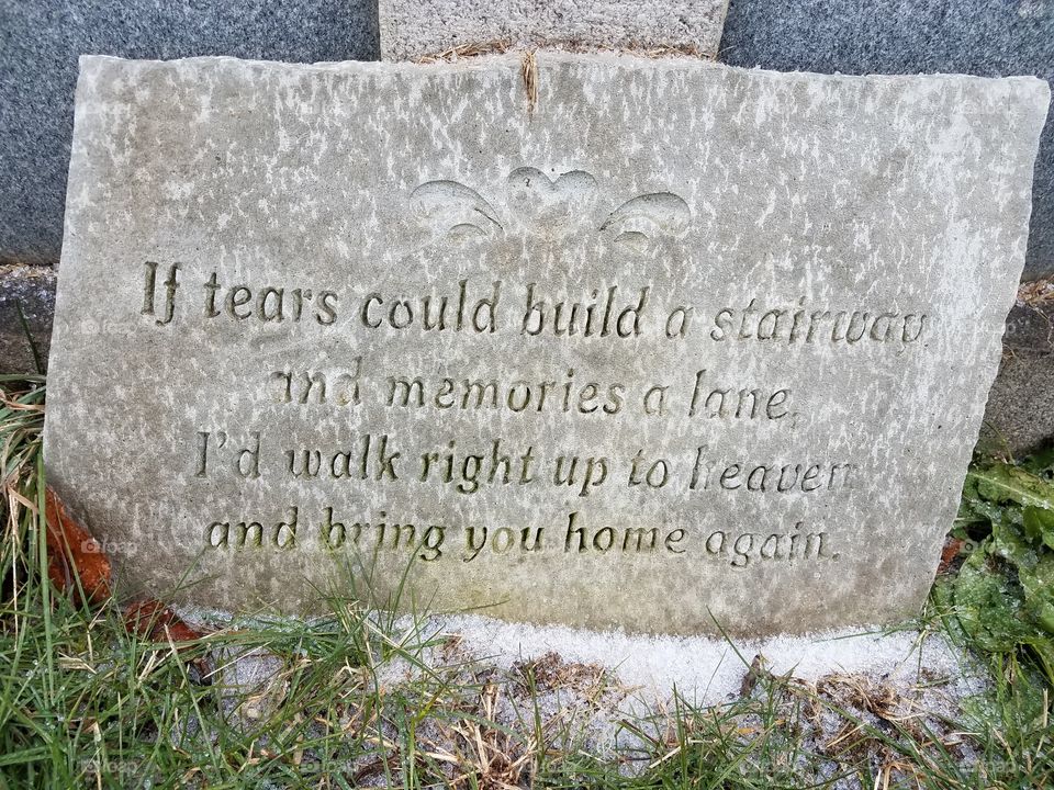 Text on gravestone at cemetery