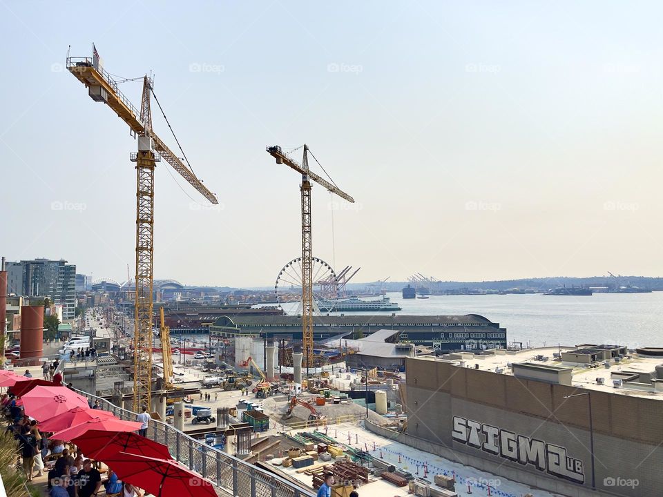 View on Seattle port with building cranes