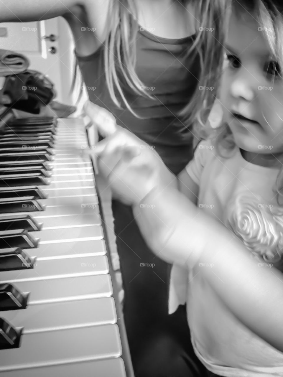 The girls playing piano! 