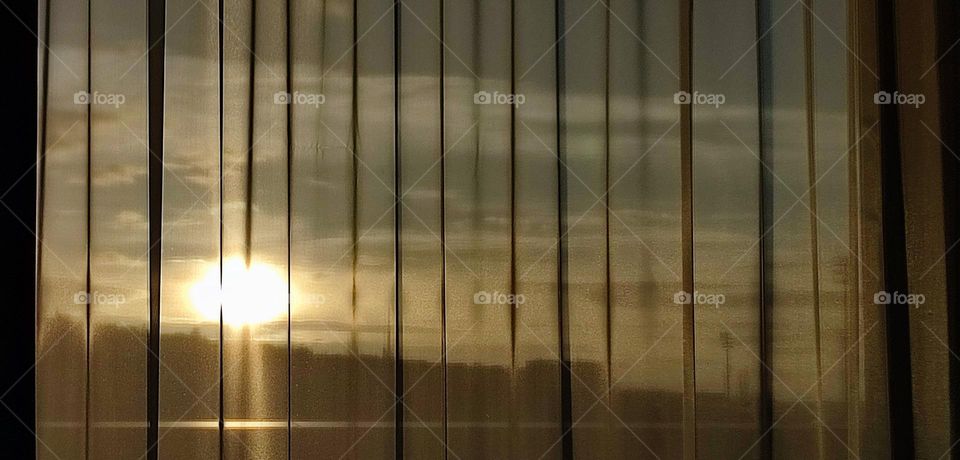 Sunset in a hotel room