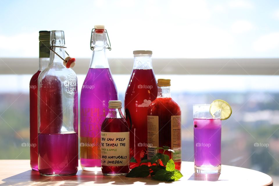 Summer juice with taste of elderberry juice, strawberries and butterfly pea flower tea 