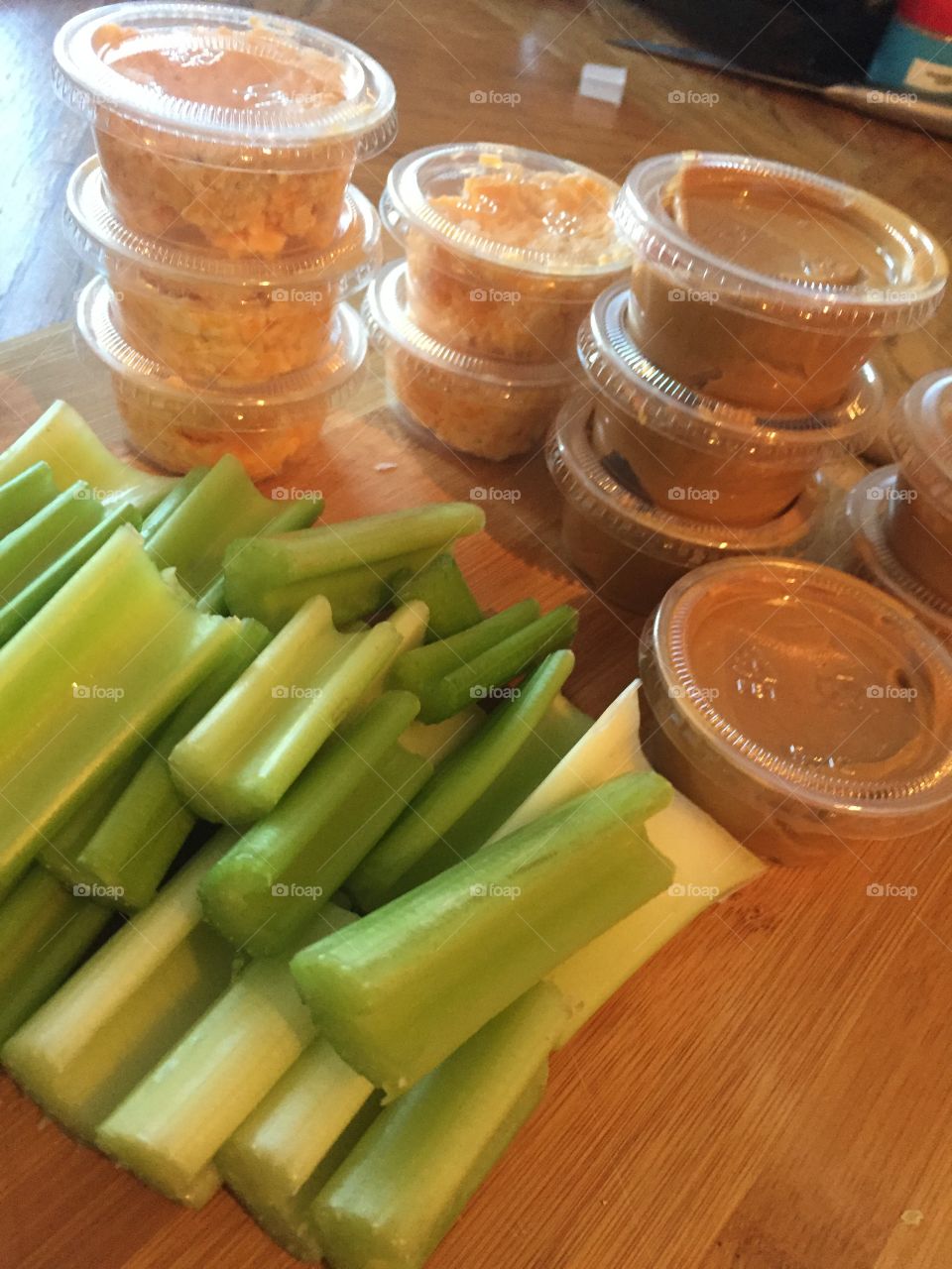 Fresh cut green veggies waiting to be dipped in these fun sized creamy peanut butter cups! The perfect healthy snack on the go!