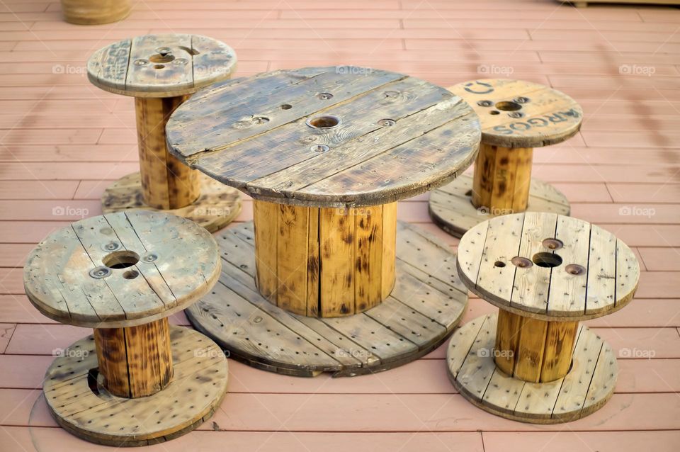 Wooden hydro cable reels used as a table setting.