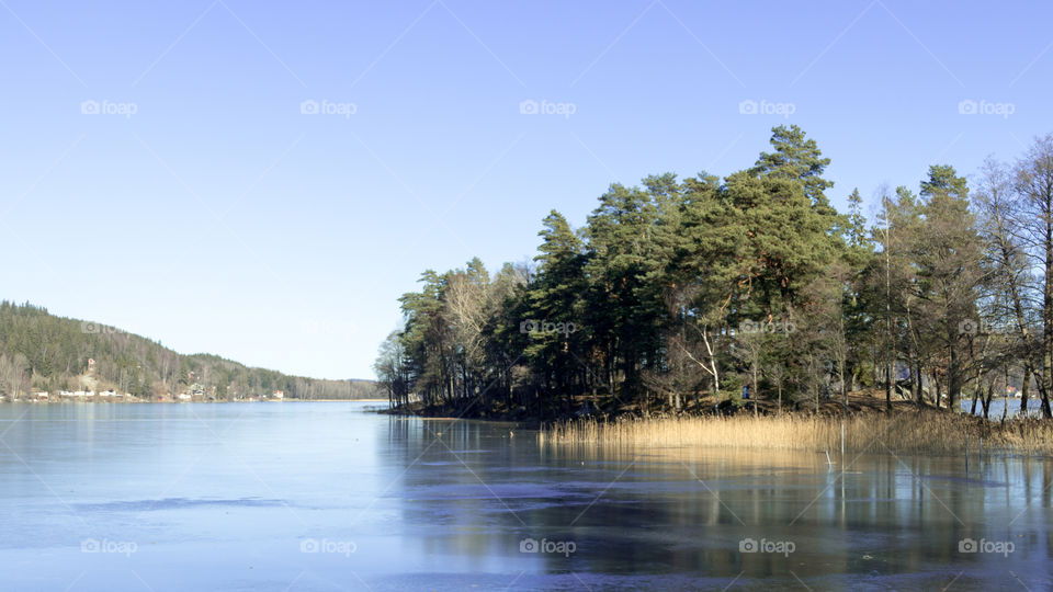 frozen lake in a natural Swedish setting.