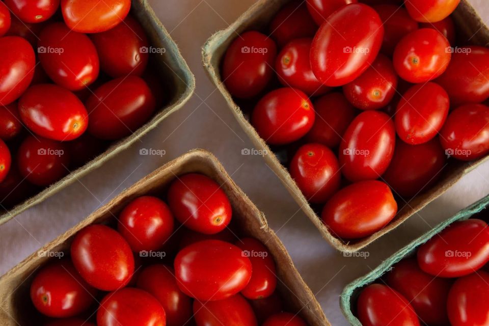 Fresh summer cherry tomatoes at farmers market 