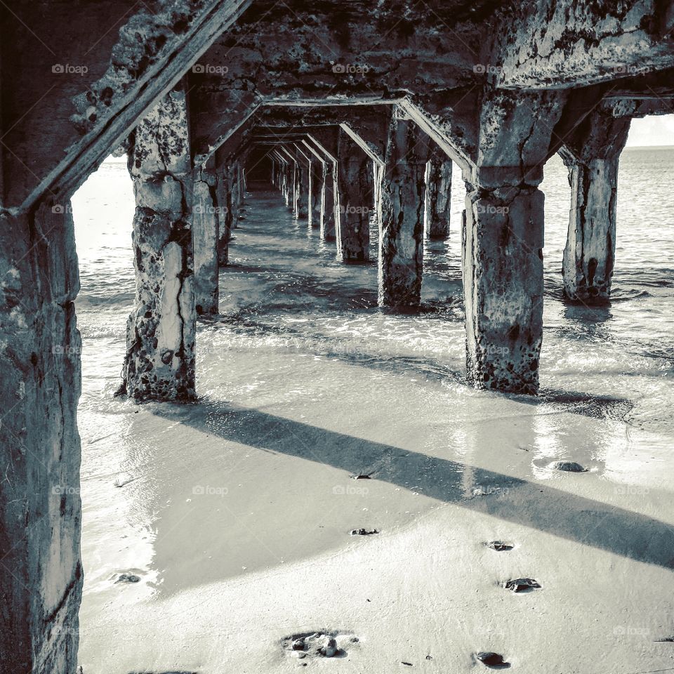 In Grand Case, St. Martin, View From Underneath The Pier As The Tide Comes In