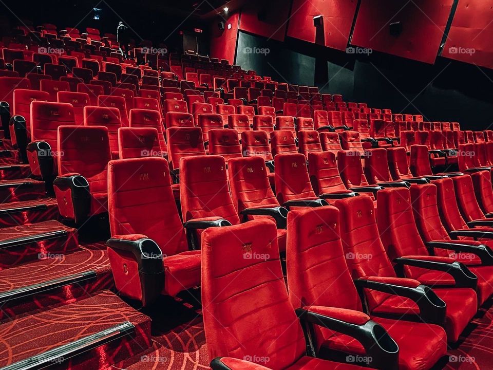 Red chairs in theatre room 