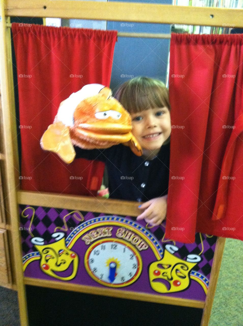 puppet show. at the public library putting on a puppet show